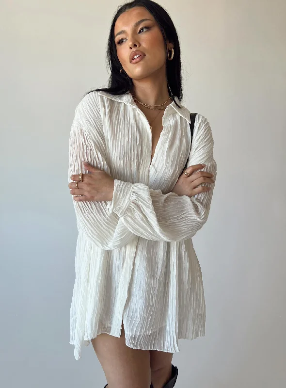 Mini dresses with asymmetric hems for a fashion - forward look Tune In Shirt Dress White